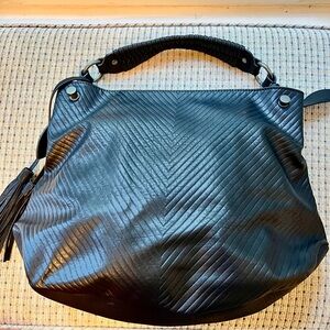 Black Textured Shoulder Bag with Slouchy Shape and Silver Accents